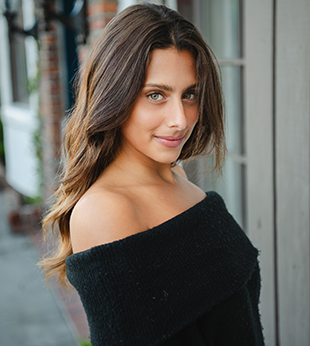 Juliana Soliman, Account Executive at BluePoint Mortgage, smiling in a professional portrait taken at the Newport Beach headquarters. She partners with mortgage brokers and loan officers to provide exceptional wholesale lending service, competitive pricing, and a seamless loan process.